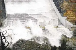  ?? DAN REIDEL AP ?? Lake Oroville has so much water that officials opened the dam’s spillways for the first time since April 2019. The lake’s water level has risen 180 feet since Dec. 1.