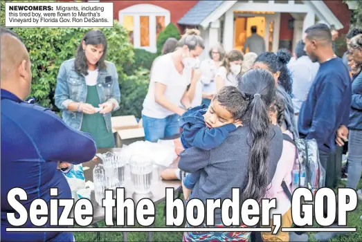  ?? ?? NEWCOMERS: Migrants, including this tired boy, were flown to Martha’s Vineyard by Florida Gov. Ron DeSantis.