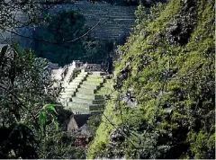  ??  ?? A glimpse of Machu Picchu just before the Huayna Picchu track starts to gain altitude.