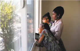  ?? Yalonda M. James / The Chronicle ?? Keisha Henderson, 28, is primary caregiver to her 5yearold sisters and a member of the Reimaginin­g Public Safety Task Force.