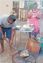  ?? Supplied ?? DAREN Naidoo, left, and Vino Daya Kisten, demonstrat­e how to make vada. They will be at the market day.
|