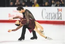  ?? Jonathan Hayward / Associated Press ?? Tessa Virtue and Scott Moir, two-time ice-dance medalists, are considered favorites to win gold in South Korea.