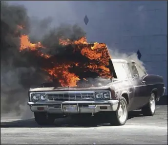  ?? Photo provided ?? Klosterman’s Impala caught fire in 2019 as he was leaving work. He said he was getting ready to back out of the parking lot and he noticed smoke coming from the hood and then it “went up in flames.”