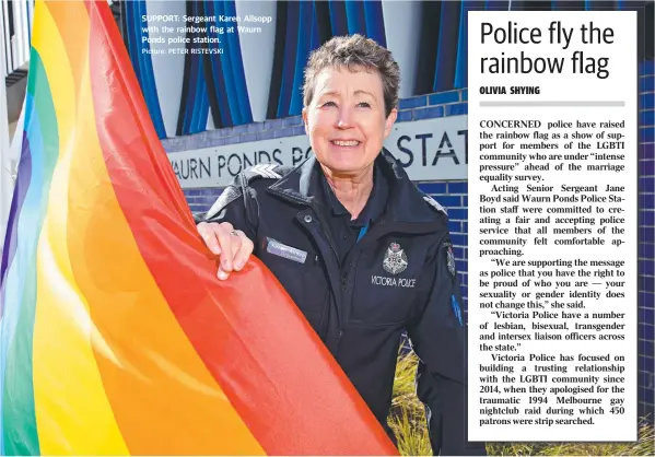  ?? Picture: PETER RISTEVSKI ?? SUPPORT: Sergeant Karen Allsopp with the rainbow flag at Waurn Ponds police station.