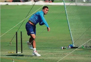  ?? AFP ?? India’s Mahendra Singh Dhoni bowls at the nets during an optional training session at Eden Gardens Stadium in Kolkata yesterday.