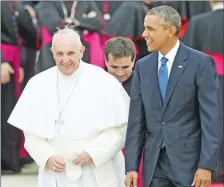  ?? SUSAN WALSH/AP ?? U.S. President Barack Obama escorts Pope Francis upon his arrival at Andrews Air Force Base, Md., on Tuesday.