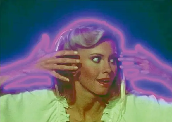  ?? ?? Olivia NewtonJohn as a goddess in Xanadu. How did she ever end up in a film with Gene Kelly and Michael Beck, below?