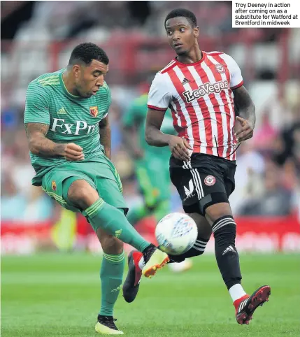  ??  ?? Troy Deeney in action after coming on as a substitute for Watford at Brentford in midweek