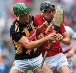  ?? SPORTSFILE ?? Iron men: Cork’s Robert Downey and Eoin Cody