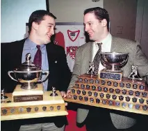  ?? JOHN MAHONEY ?? J.P., left, and Mathieu Darche hold their McGill Most Valuable Player trophies at awards banquet at Molson Breweries in 1998.