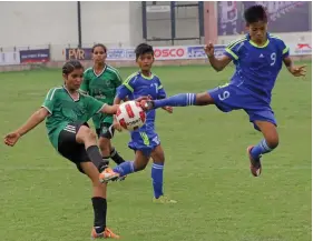  ??  ?? Action from the Subroto Cup U- 17 girls league match between Chanambam Thambou Higher Secondary School from Manipur and Ranchi’s YUWA India. The Manipur school won 7- 1.