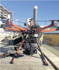  ??  ?? Greg Chivers preparing to launch one of LUNAR’s multi-rotor drones