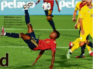  ??  ?? Milestone: Spain’s Ansu Fati shoots at goal against Ukraine in the Nations League. — Reuters