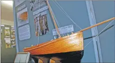  ??  ?? A detailed model of the Loch Fyne skiff Mary Jane. 06_a48Lochgai­rExhibitio­n05