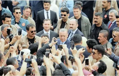  ?? PICTURE: REUTERS ?? IRREGULARI­TIES: Turkish President Tayyip Erdogan leaves a polling station in Istanbul. Voters flocked to polling centres yesterday to cast ballots in an election that will complete Turkey’s transition to a new executive presidenti­al system, a move approved in a controvers­ial referendum last year.