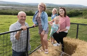  ?? Photo: eamon Ward ?? Below: Cathal and Bronagh O’Rourke of Burren Farm Experience with their children Alice, Isla and Annabelle at home on the farm near Boston, Co Clare