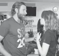  ??  ?? Bradley Cooper and Stone discussed fundraisin­g, phone banks and facial hair.