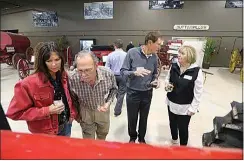  ?? THE CALIFORNIA­N, FILE ?? Ron Lehr, second from left, with daughter Shae’ Lehr, Lou Barbich and Ron’s wife, Micki Lehr, look over a tractor the Lehrs donated to the Kern County Museum’s Ray Watson Transporta­tion Exhibit, which celebrated its pre-opening in March 2020. Ron Lehr died unexpected­ly Feb. 2.