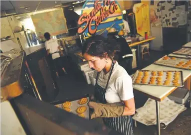  ?? Joe Amon, Denver Post file ?? Alexis McLean is now baking the cookies at her late aunt’s store, the Santa Fe Cookie Co.