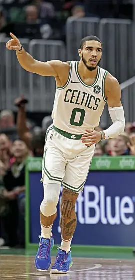  ??  ?? stuart CaHIll / Herald staff fIle; left, Matt stOne / Herald staff fIle OUT: Celtics forward Jayson Tatum and guard Carsen Edwards, left, will not travel with the team for tonight’s tilt in Philadelph­ia.