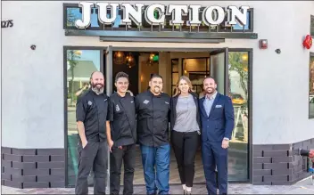  ?? Cory Rubin/The Signal ?? Old Town Junction’s owners and chefs stand in front of the location in Newhall.