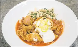  ?? STEPHEN BRUN/THE GUARDIAN ?? Chicken paprikash is classic Hungarian comfort food, says Chef Ilona Daniel and was one of her late mother’s favourite Hungarian recipes.