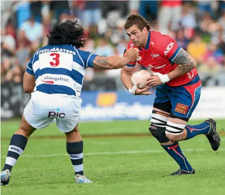  ??  ?? Liam Squire makes a break during the Mitre 10 Cup Premiershi­p semifinal against Auckland last year.