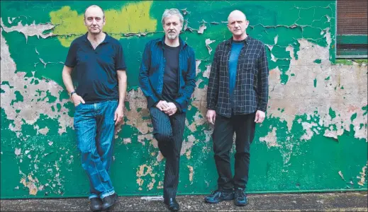  ??  ?? UNPREDICTA­BLE: The Necks, from left, Lloyd Swanton, Tony Buck and Chris Abrahams, will perform at Mona next weekend. Picture: CHRIS HOLLY