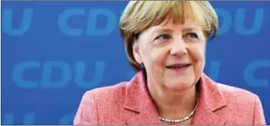  ?? TOBIAS SCHWARZ/AFP ?? German Chancellor Angela Merkel told her conservati­ve party yesterday that she wants to seek a fourth term in elections next year, party sources said.