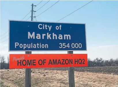  ?? TWITTER/THE CANADIAN PRESS ?? Markham installed 23 bright orange signs on Monday throughout the city, dubbing it the “possible home of Amazon HQ2.”