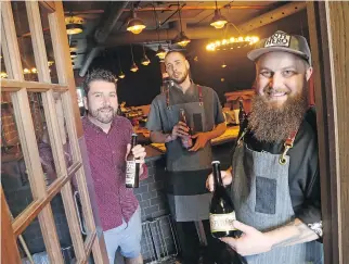  ??  ?? From left, Anthony Spagnolo, owner, Blain Wagg, sous-chef and Jeff Bradfield, chef-owner of Bar Lupulus on Wellington Street West in Ottawa. The establishm­ent is set to open on Wednesday,