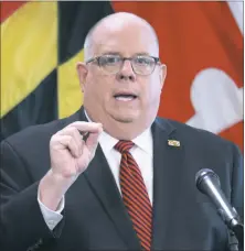  ?? AP PHOTO BY BRIAN WITTE ?? In this June 3 file photo, Gov. Larry Hogan announces he will lift an order that closed non-essential businesses during a news conference in Annapolis. Hogan, who considered a primary challenge to President Donald Trump last year, announced Tuesday, July 7 he is releasing a book about national politics and his experience as governor.