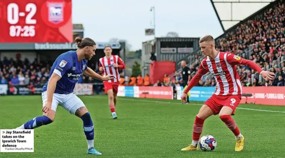  ?? Frankie OKeeffe/PPAUK ?? > Jay Stansfield takes on the Ipswich Town defence