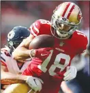  ?? NHAT V. MEYER/TRIBUNE NEWS SERVICE ?? The 49ers' Dante Pettis bobbles a catch, but holds on to it, against the Bears' Kyle Fuller last season in Santa Clara.