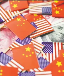  ?? REUTERS FILES
JASON LEE/ ?? U.S. President Donald Trump’s negotiatin­g style seems to be to load up the pressure on China, then relent enough to keep hopes up there might be a resolution, then pile on more pressure, writes Joe Chidley.