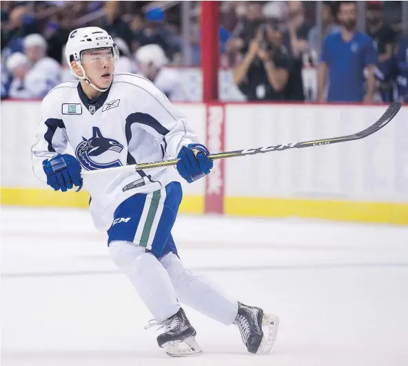  ?? GERRY KAHRMANN/PNG FILES ?? Simon Chen, shown here playing in the Canucks Summer Showdown Top Prospect game at Rogers Arena on July 6, is hoping to land a hockey scholarshi­p at a U.S. college.