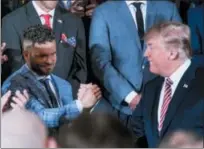  ?? ANDREW HARNIK — THE ASSOCIATED PRESS ?? President Donald Trump shakes hands with Houston Astros second baseman Jose Altuve during a ceremony in the East Room of the White House in Washington, Monday where he honored the World Series Champion Houston Astros for their 2017World Series victory.