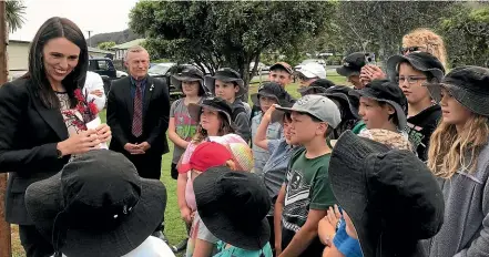  ?? JOANNE CARROLL/STUFF ?? Prime Minister Jacinda Ardern visits Barrytown School on the West Coast.