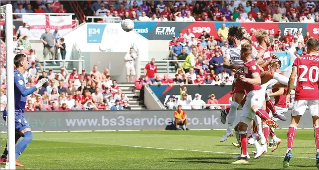  ?? PICTURE: PA Images ?? HIGH RISER: Andreas Weimann scores for Bristol City