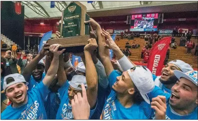  ?? AP/DON PETERSON ?? Radford players (from left) Caleb Tanner, Carlik Jones, Devonnte Holland, Darius Bolstad and John Caldwell celebrate after defeating Liberty in the Big South Tournament championsh­ip game Sunday in Radford, Va. Jones made a three-pointer at the buzzer...