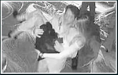  ??  ?? CCTV SHOWS MODEL ‘TOO DRUNK TO WALK’ BEING CARRIED OUT OF CLUB... OR DOES IT? CCTV from 9 Club (above) – taken at 5.22am on the day Ivana Smit died – shows Alex Johnson carrying the model in his arms. Some say it suggests that she was being coerced or...