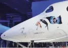  ?? TREVOR HUGHES/USA TODAY ?? Virgin Galactic’s VSS Unity is one of a new generation of spacecraft in the race toward inexpensiv­e space travel.