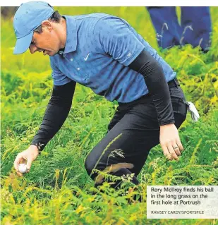  ?? RAMSEY CARDY/SPORTSFILE ?? Rory McIlroy finds his ball in the long grass on the first hole at Portrush