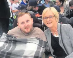 ??  ?? Declan McMullan with his mother Brenda at Croke Park in Dublin, where he received a blessing from Pope Francis (right)