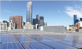 ?? Photograph: Tracey Nearmy/ AAP ?? New research by Monash University suggests central Melbourne could produce most of its electricit­y from solar panels if millions more were installed.