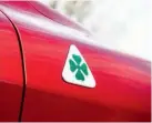  ??  ?? ‘Quadrifogl­io Verde’ four-leaf clover motif sits above the front wheel arches. First appeared on Ugo Sivocci’s Alfa Romeo RL Targa Florio, with which he won the race of the same name in 1923.