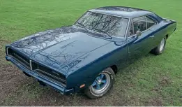  ??  ?? 1969 Dodge Charger 440cu in /7.2-litre big block with a 727 Torqueflit­e three-speed auto transmissi­on. Owned and loved by Jim Warren.