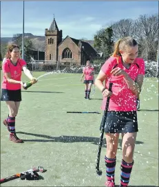  ?? 01_A13hockey0­2 ?? Freya McNicol gets showered in Champagne.