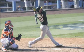  ?? PHOTO BY HARRY HOW — GETTY IMAGES ?? The A’s Chad Pinder hits a three-run home run against the Houston Astros during the seventh inning in Game 3 of the American League Division Series at Dodger Stadium on Wednesday in Los Angeles.