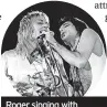  ?? ?? Roger singing with Freddie Mercury in 1976